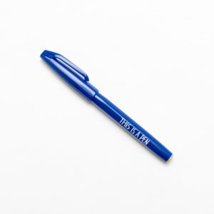 blue pen with text "This is a pen", designed by Noritake